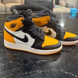 Nike High-Top Sneakers in Black, White, and Orange